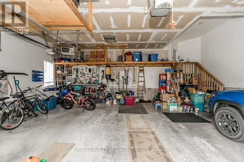 72 Luella Boulevard, Springwater, ON - Indoor Photo Showing Garage