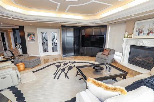 700 1 Wellington Crescent, Winnipeg, MB - Indoor Photo Showing Living Room With Fireplace