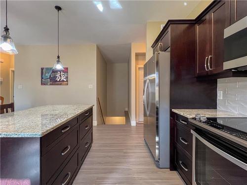 2 Augusta Crescent, Brandon, MB - Indoor Photo Showing Kitchen With Upgraded Kitchen