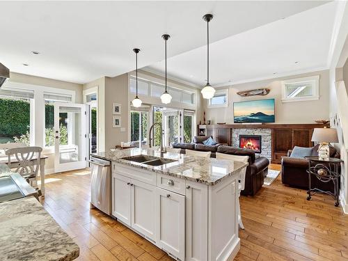 28-5251 Island Hwy West, Qualicum Beach, BC - Indoor Photo Showing Kitchen With Fireplace With Double Sink With Upgraded Kitchen