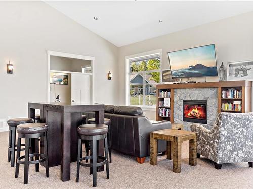 28-5251 Island Hwy West, Qualicum Beach, BC - Indoor With Fireplace