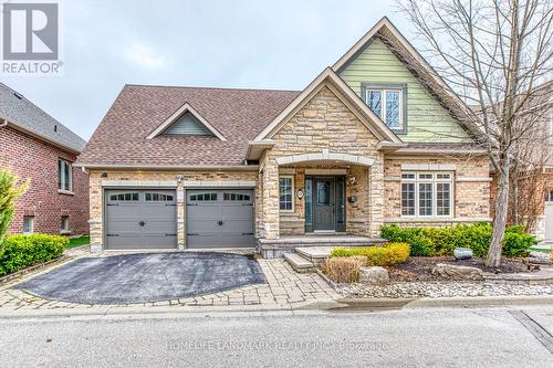12 - 2417 Old Carriage Road, Mississauga, ON - Outdoor With Facade