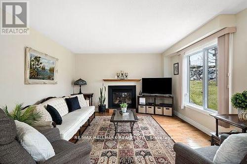 42 Winnifred Avenue, Parry Sound, ON - Indoor Photo Showing Living Room With Fireplace
