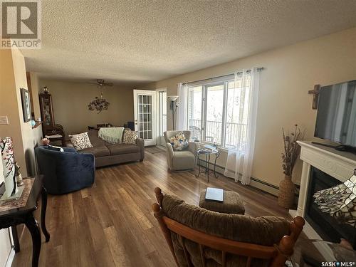 6 40 18Th Street W, Prince Albert, SK - Indoor Photo Showing Living Room With Fireplace