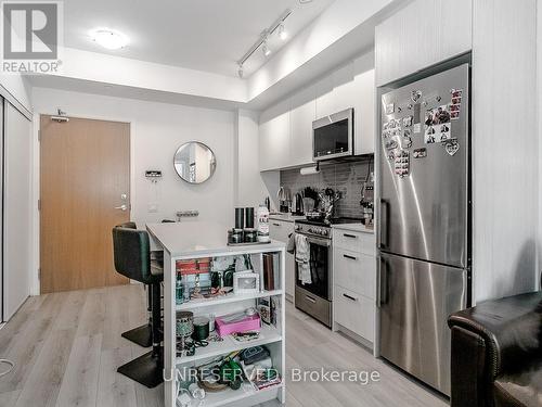 214 - 1787 St Clair Avenue W, Toronto, ON - Indoor Photo Showing Kitchen With Stainless Steel Kitchen