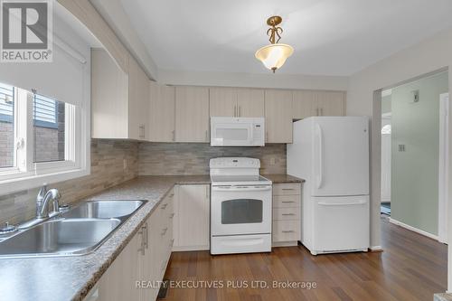 17 Mangrove Road, Brampton, ON - Indoor Photo Showing Kitchen With Double Sink