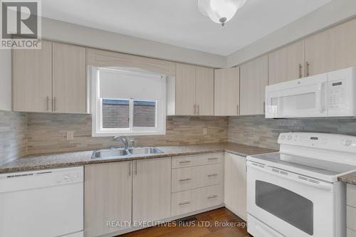 17 Mangrove Road, Brampton, ON - Indoor Photo Showing Kitchen With Double Sink
