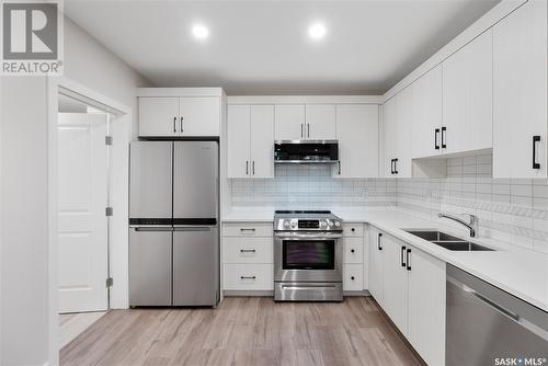 351 Arscott Crescent, Saskatoon, SK - Indoor Photo Showing Kitchen With Stainless Steel Kitchen With Double Sink With Upgraded Kitchen