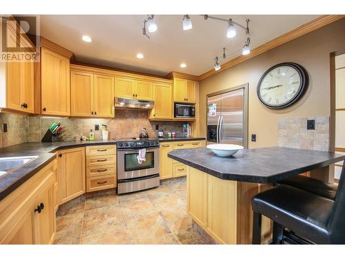 7801 97 Highway, Oliver, BC - Indoor Photo Showing Kitchen