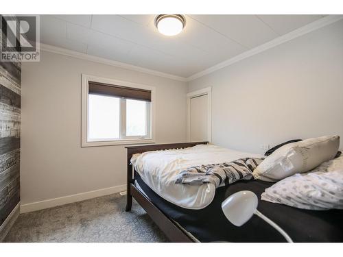7801 97 Highway, Oliver, BC - Indoor Photo Showing Bedroom