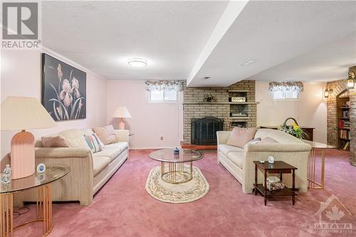 704 Eastfield Street, Ottawa, ON - Indoor Photo Showing Living Room With Fireplace