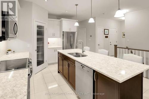 7 - 37 Brookside Terrace, West Lincoln, ON - Indoor Photo Showing Kitchen With Double Sink With Upgraded Kitchen