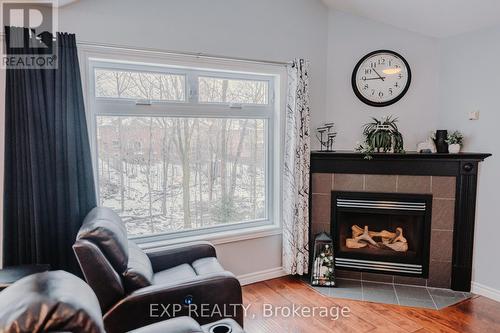 36 Osprey Ridge Road W, Barrie, ON - Indoor Photo Showing Living Room With Fireplace
