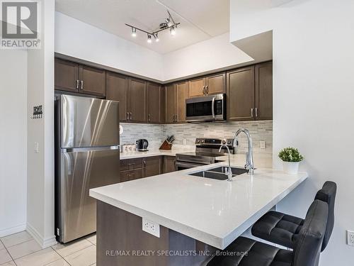 311 - 650 Sauve Street, Milton, ON - Indoor Photo Showing Kitchen With Stainless Steel Kitchen With Double Sink With Upgraded Kitchen