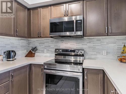 311 - 650 Sauve Street, Milton, ON - Indoor Photo Showing Kitchen With Upgraded Kitchen