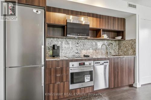 304 - 7 Mabelle Avenue, Toronto, ON - Indoor Photo Showing Kitchen With Upgraded Kitchen