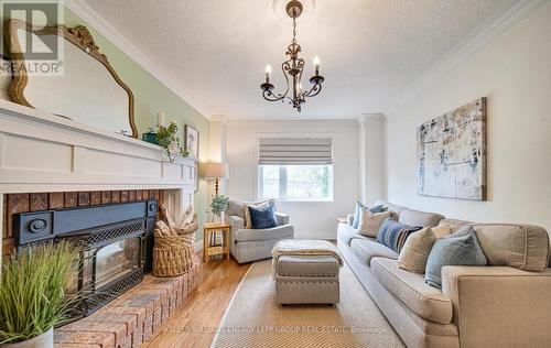 71 William Stephenson Drive, Whitby, ON - Indoor Photo Showing Living Room With Fireplace