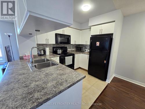 1505 - 4090 Living Arts Drive, Mississauga, ON - Indoor Photo Showing Kitchen With Double Sink