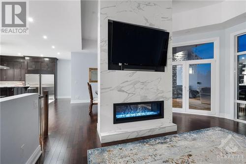 711 Ballycastle Crescent, Ottawa, ON - Indoor Photo Showing Living Room With Fireplace