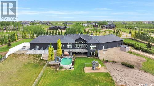 129 Slater Crescent, Edenwold Rm No. 158, SK - Outdoor With Above Ground Pool With View