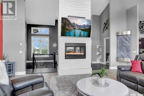 129 Slater Crescent, Edenwold Rm No. 158, SK - Indoor Photo Showing Living Room With Fireplace
