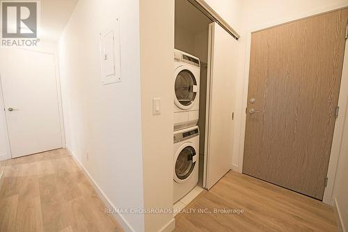 808 - 215 Queen Street W, Toronto, ON - Indoor Photo Showing Laundry Room