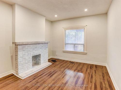 Main-709 Gladstone Ave, Toronto, ON - Indoor Photo Showing Other Room With Fireplace