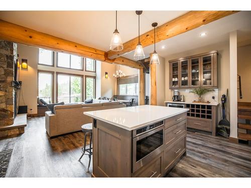 502 - 5258 Highline Drive, Fernie, BC - Indoor Photo Showing Kitchen With Fireplace