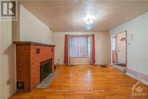 48 Queen Mary Street, Ottawa, ON - Indoor Photo Showing Other Room With Fireplace