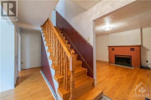 48 Queen Mary Street, Ottawa, ON - Indoor Photo Showing Other Room With Fireplace