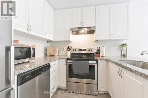 503 - 1711 Pure Springs Boulevard, Pickering, ON - Indoor Photo Showing Kitchen With Upgraded Kitchen