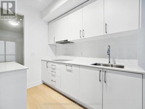 707 - 88 Cumberland Street, Toronto, ON - Indoor Photo Showing Kitchen With Double Sink