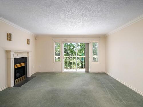 16-106 Aldersmith Pl, View Royal, BC - Indoor Photo Showing Living Room With Fireplace