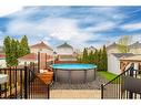 Backyard - 568 Rue Migneault, Longueuil (Le Vieux-Longueuil), QC  - Outdoor With Above Ground Pool With Exterior 