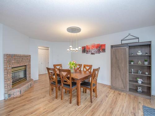 4301 9 Street, Vernon, BC - Indoor Photo Showing Dining Room With Fireplace