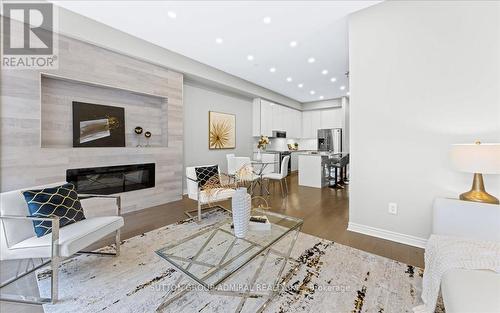 131 Lebovic Campus Drive, Vaughan, ON - Indoor Photo Showing Living Room With Fireplace
