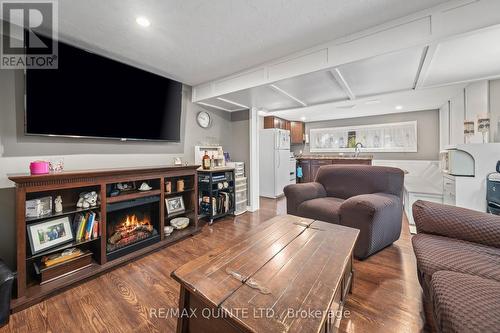 16 Maple Drive, Belleville, ON - Indoor Photo Showing Living Room With Fireplace