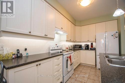 20 Deacon Crescent, Kawartha Lakes, ON - Indoor Photo Showing Kitchen With Double Sink