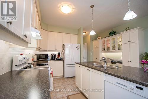 20 Deacon Crescent, Kawartha Lakes, ON - Indoor Photo Showing Kitchen With Double Sink