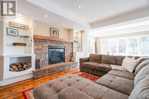 7 Pine Point, Oro-Medonte, ON - Indoor Photo Showing Living Room With Fireplace