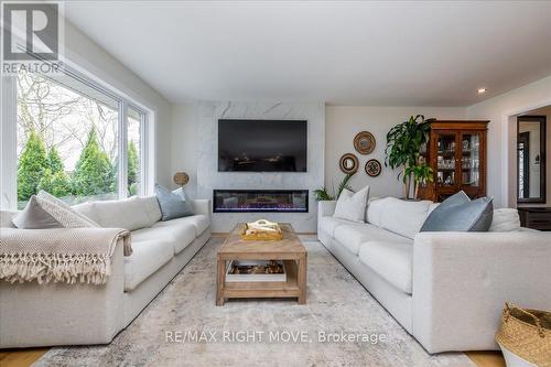 3789 Wood Avenue, Severn, ON - Indoor Photo Showing Living Room With Fireplace