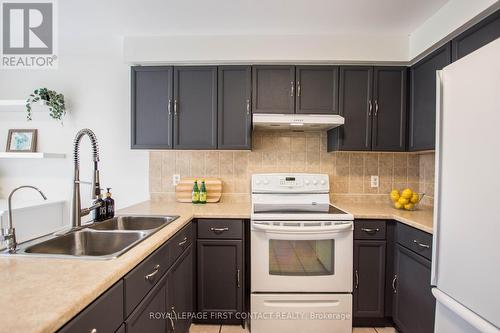 22 Carr Drive, Barrie, ON - Indoor Photo Showing Kitchen With Double Sink