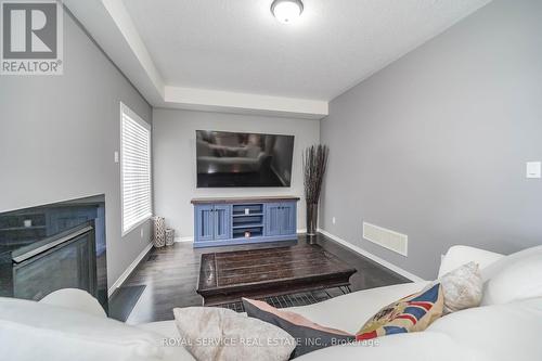 2084 Queensbury Drive, Oshawa, ON - Indoor Photo Showing Living Room With Fireplace