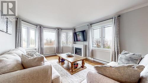 8 Healeys Cove Road Unit#A, Holyrood, NL - Indoor Photo Showing Living Room With Fireplace