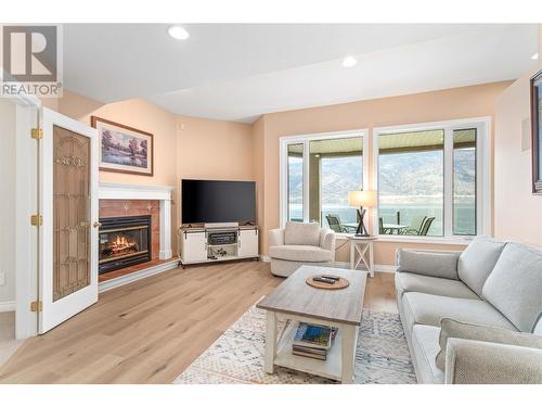 2200 Dewdney Road, Kelowna, BC - Indoor Photo Showing Living Room With Fireplace