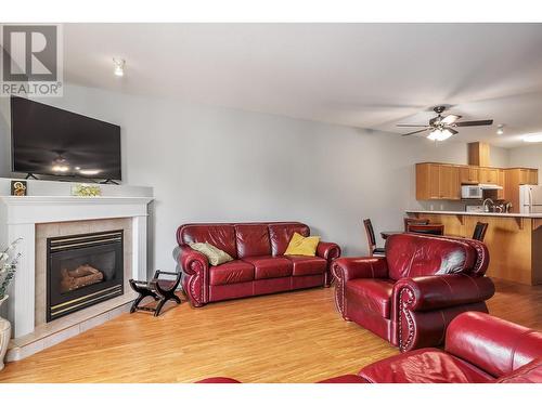 2388 Baron Road Unit# 209, Kelowna, BC - Indoor Photo Showing Living Room With Fireplace