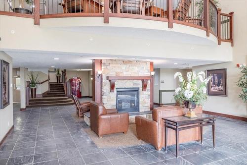 310 - 1500 Mcdonald Avenue, Fernie, BC - Indoor With Fireplace