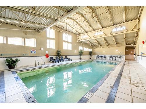 310 - 1500 Mcdonald Avenue, Fernie, BC - Indoor Photo Showing Other Room With In Ground Pool