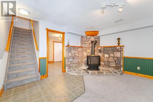 733036 Southgate 73 Sideroad, Southgate, ON -  Photo Showing Other Room With Fireplace