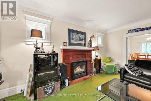 91 Delaware Avenue, Hamilton, ON - Indoor Photo Showing Living Room With Fireplace